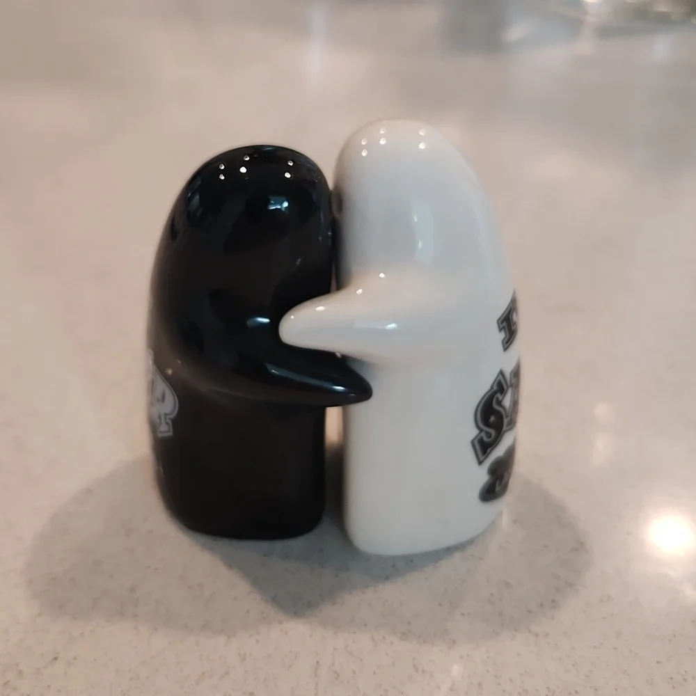 Black and white ghost Las Vegas salt and pepper shakers, new without tags!